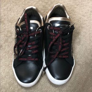 Black leather studded sneakers